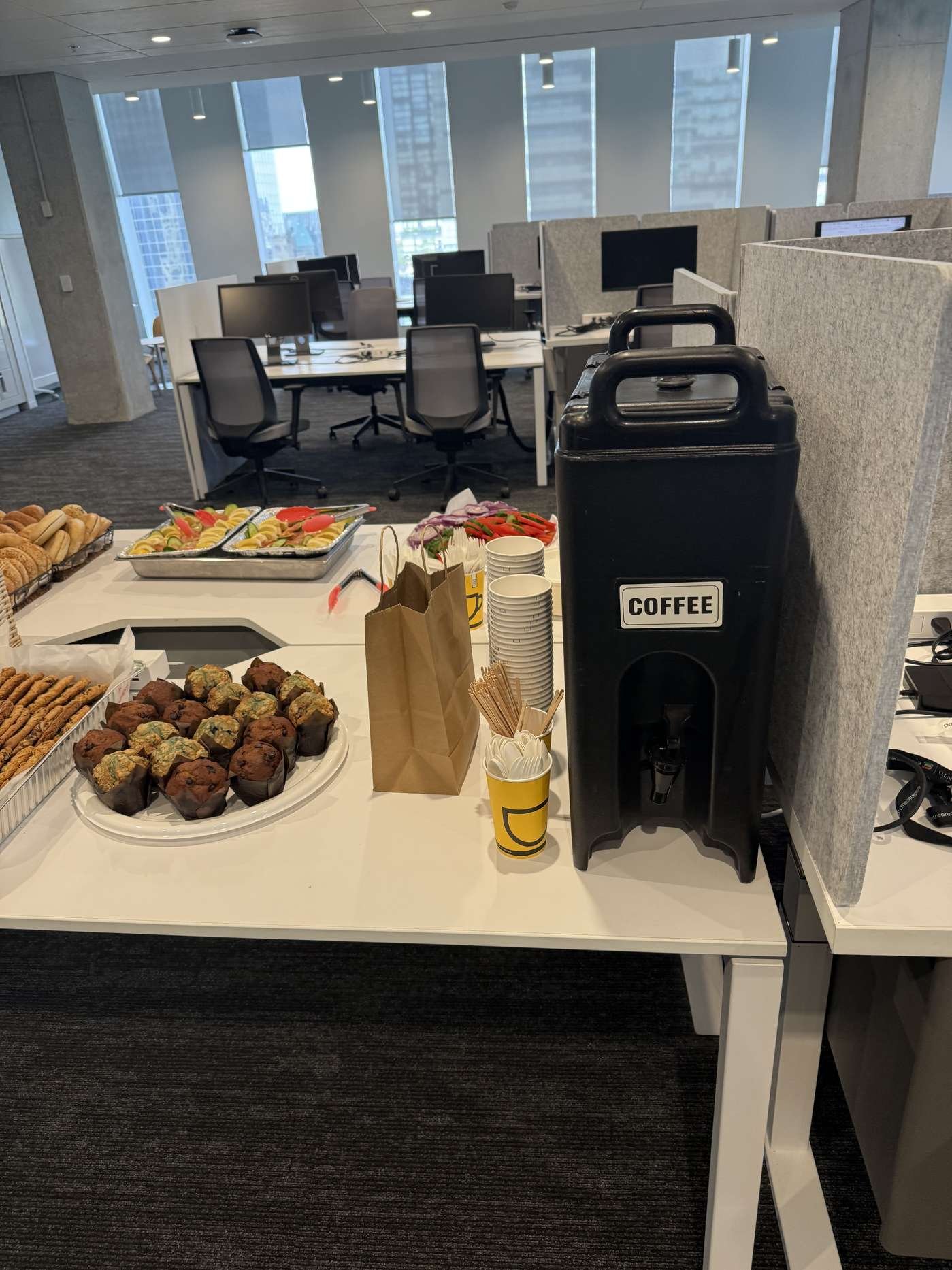 Coffee service and catering trays set up in a downtown Toronto office